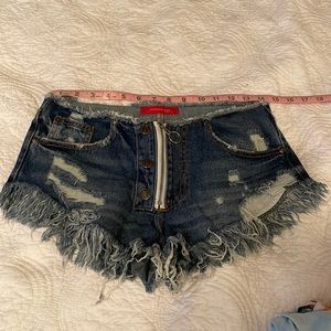 Dolls kill fringe shorts small
